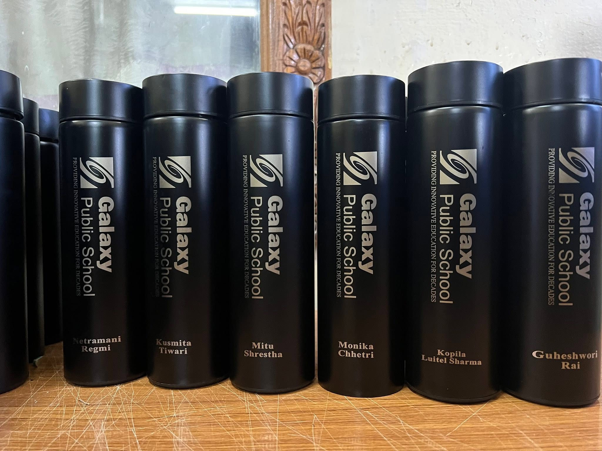 Black bottles engraved for Galaxy Public School